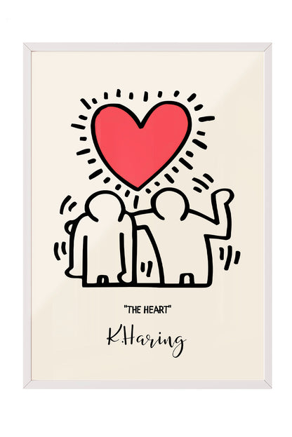Siyah çerçeveli, bej zeminli, Keith Haring tarzı iki insan figürü ve parlak kırmızı kalp içeren modern sanat posteri.