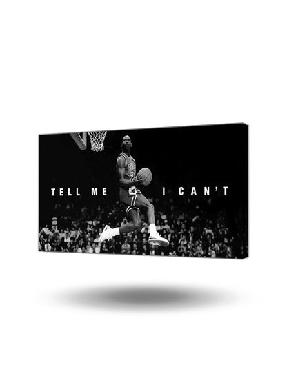 Siyah beyaz Michael Jordan'ın basketbol potasına smaç yaparken çekilmiş, 'Tell Me I Can't' yazılı motivasyon kanvas tablo.